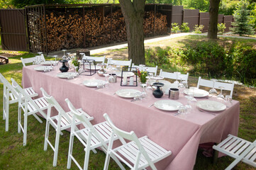beautiful table setting with flowers and snacks at wedding reception. wedding decorations