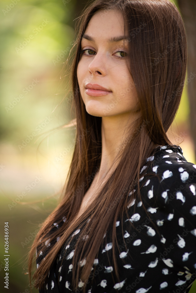 Wall mural Summer portrait of beautiful young woman