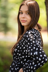 Summer portrait of beautiful young woman