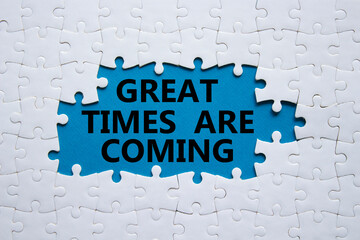 Great times are coming symbol. Concept words Great times are coming on white puzzle. Beautiful blue background. Business and Great times are coming concept. Copy space.
