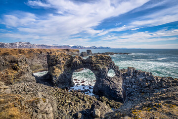 Gatklettur, a rock arch near Arnarstapi and Hellnar on the Snaefellsnes Peninsula in western Iceland.