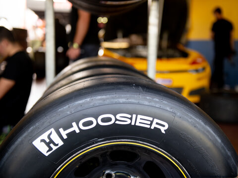 Hoosier race tire for car, racing wquipment in team workshop