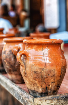 Traditional Moroccan earthenware cookery in outdoor market