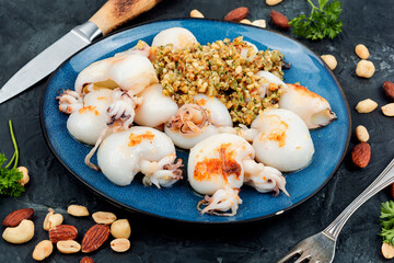 Grilled calamari squid with nuts.