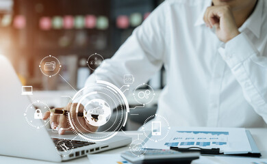 Person typing laptop computer and tablet with SDK icon on virtual screen. SDK Software development kit programming language technology concept in office.