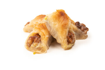 Delicious sweet baklava with walnuts isolated on white background.
