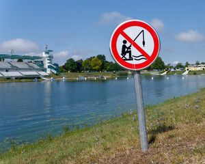 No fishing sign placed on a lakeshore, Jarun Lake, Zagreb, Croatia