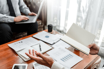 Business team meeting Strategy Planning with new startup project plan Finance and Economy Graph with laptop successful teamwork.