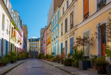 Colorful bright buildings on Cremieux street in Paris, France, Europe