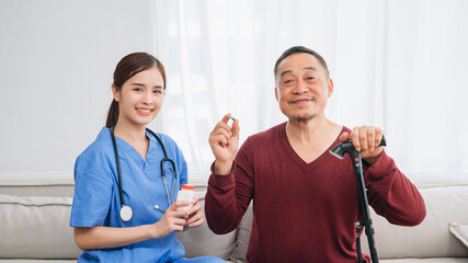 Elderly Man Receives Compassionate Support from Medical Staff. Medical staff taking and caregiver...