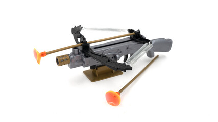 Plastic toy crossbow isolated on white background