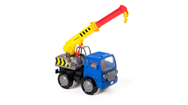 Toy truck crane isolated over white background.