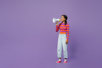 Full body little kid teen girl 15-16 years old wear striped orange sweatshirt hold megaphone scream...