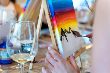 Vino and Art: Friends Bonding over Creative Expression