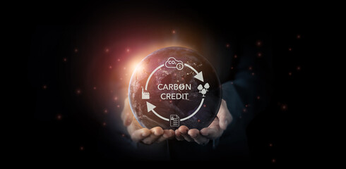 Fototapeta na wymiar Carbon credit concept. Tradable certificate to drive industry and company in the direction of low emissions in efficiency cost. Green concept with carbon offsetting solution symbols.
