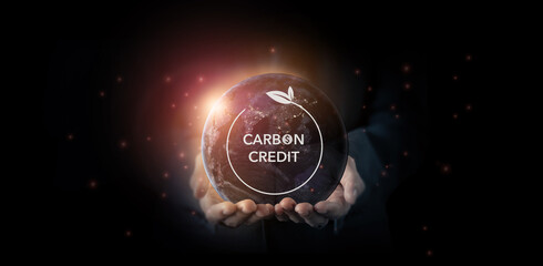 Carbon credit concept. Tradable certificate to drive industry and company in the direction of low emissions in efficiency cost. Green concept with carbon offsetting solution symbols.
