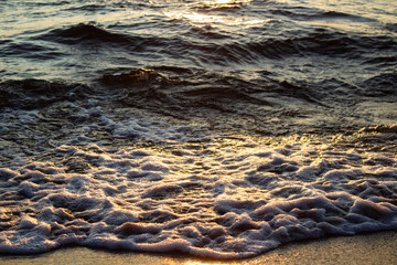 Lake Baikal waves in sunset