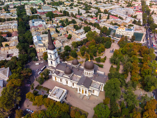 Fototapeta premium View of the Transfiguration Cathedral in Odessa before a Russian missile hit. Beautiful top view of the central cathedral in Odessa. Cathedral before destruction. Top view of Odessa in autumn.