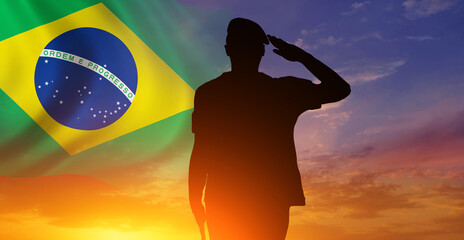 Solider Saluting Against the flag of Brazil. Concept of national holidays. Independence Day. 3d...