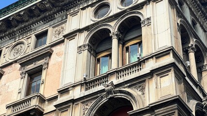 Fototapeta premium Facade of a historic building in the center of Milan. Milan architecture