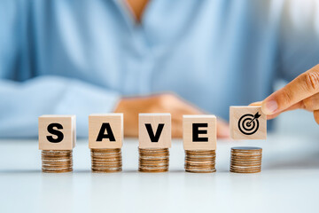 Woman stacking money coins accounting for financial interest Save money for prepare in the future ,business investment concept.