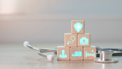 Medical icons on wooden cubes with medical network connection increased public health care Growth...