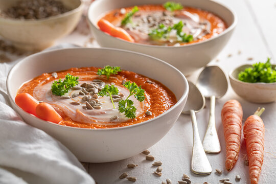Vegan carrot soup as spring and fresh appetizer.