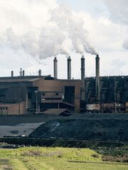 Factory with smoke stacks