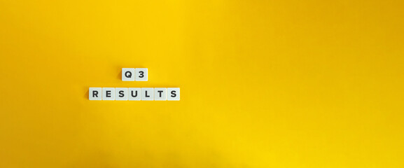 Q3 (third quarter) Business Results. Fiscal Quarters, Company Financial Calendar Concept. Block Letters on Bright Orange Background.