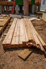  View of Select pine 2X4 framing lumber delivered to a job for building the exterior walls of a house that  meets current building regulations