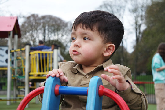 Beautiful Close up Portrait of an Asian Pakistani Baby Boy Named Ahmed Mustafain Haider is Posing at Wardown Public and Children Park of Luton, England UK. Image Was Captured on April 03rd, 2023.	