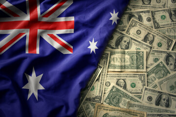 colorful waving national flag of australia on a american dollar money background. finance concept © luzitanija
