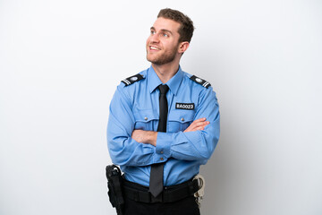 Young police caucasian man isolated on white background happy and smiling