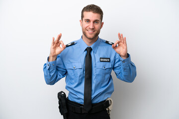 Young police caucasian man isolated on white background showing an ok sign with fingers