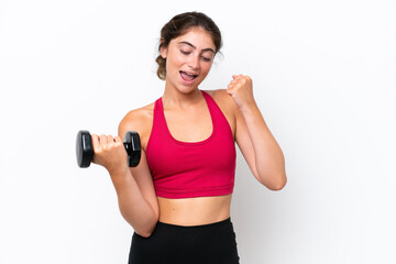 Young sport caucasian woman making weightlifting isolated on white background celebrating a victory