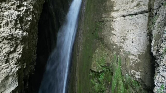 Panoramic aerial view of Chute de la Druise Waterfall. This is a large waterfall on the river Gervanne, located in Drôme, in the Auvergne-Rhône-Alpes region