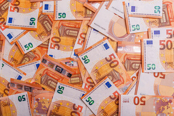 Fototapeta na wymiar 50 euro banknotes as an abstract business background.