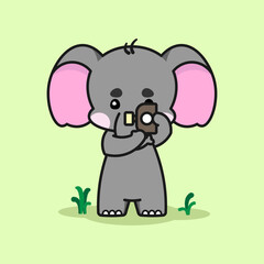 Adorable elephant is capturing an image. Cute elephant cartoon illustration isolated in green background. Vector illustration. Fit for mascot, children's book, icon, t-shirt design, etc