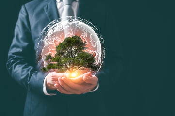 Reduce CO2 emission concept.Sustainable development and green business based on renewable energy. save earth stop climate change and global warming.tree on hand, earth day, business and environment