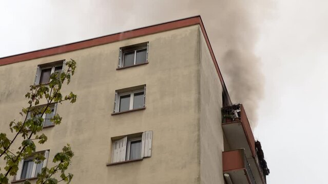 Witness the aftermath of a devastating fire in a high-rise apartment building