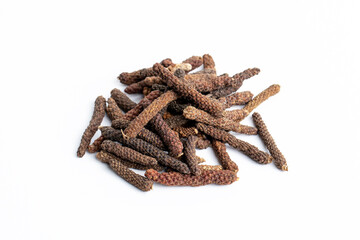 long pepper, heap of pippali (Piper Longum ,Piper retrofractum) dried herb ingredient isolated in white background.
