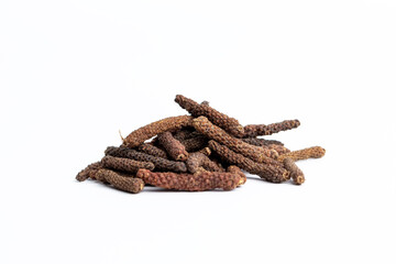 long pepper, heap of pippali (Piper Longum ,Piper retrofractum) dried herb ingredient isolated in white background.
