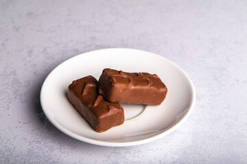 two chocolates on a plate
