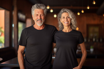Fototapeta na wymiar Old mature couple with matching Mockup black t-shirt Mockup , happy lovely man and woman