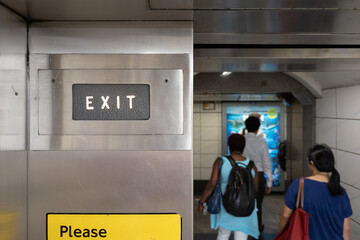 Exit sign on way out from elevator