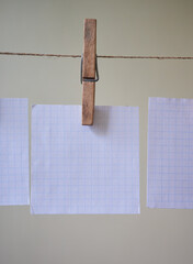 checkered paper hanging on a clipboard