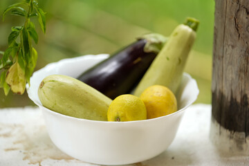 white bowl with seasonal vegetables. detail.