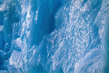 Shiny ice wall on an iceberg