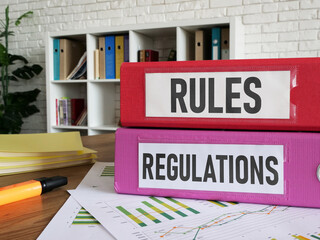 Rules and Regulations. Business concept background in office with papers and files