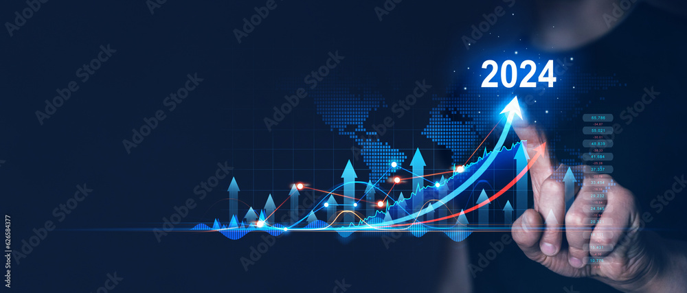 Wall mural businessman holding growth graph a year 2024 of business and data analysis. development to success i